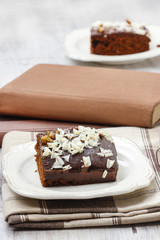 Gingerbread cake with chocolate and hazelnuts. Selective focus