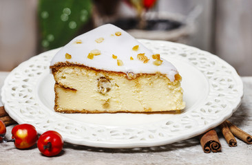 Cheesecake in christmas eve setting. Poinsettia flower