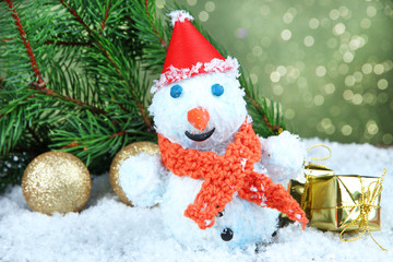 Beautiful snowman and Christmas decor, on bright background
