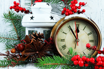 Clock with fir branches and Christmas decorations