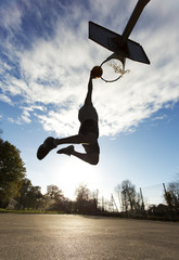 Basketball player slam dunk silhouette - 59377674