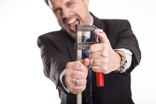 Manager mit Daumenschrauben Zwang zwingen