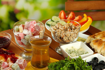 Traditional Turkish breakfast on table on bright background