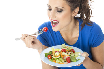 Young Woman Eating Mixed Salad