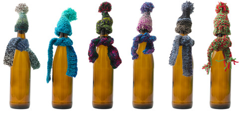 Collection of Bottles with Scarf and Hat