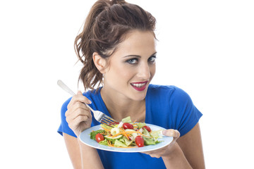 Young Woman Eating Mixed Salad