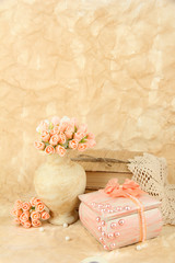 Beautiful still life with vintage casket and flowers