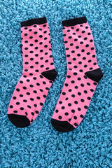 Colorful socks, on color background