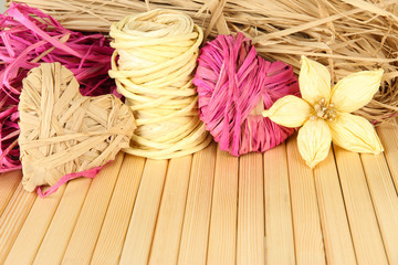 Fototapeta na wymiar Decorative straw for hand made, flower and heart of straw,