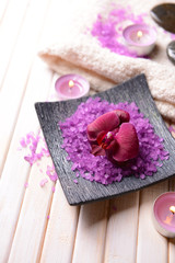 Still life with beautiful blooming orchid flower, towel and