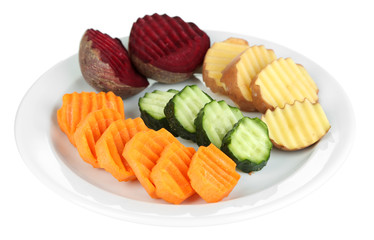 Fototapeta na wymiar Beautiful sliced vegetables on plate, isolated on white