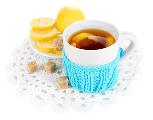 Cup of tea with lemon isolated on white