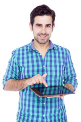 Handsome smiling man using a tablet computer, isolated over a wh