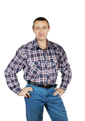 Fototapeta premium Adult man dressed in jeans and a plaid shirt