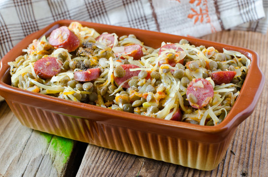 Cabbage stew with lentils and sausages