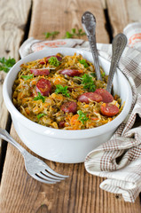 Cabbage stew with lentils and sausages