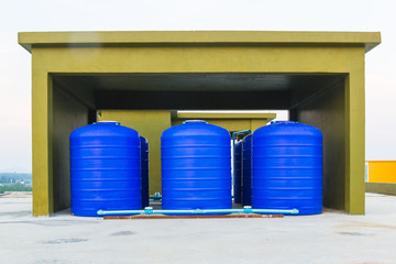 blue plastic water tank