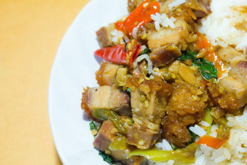 Stir-fried crispy pork with basil leaves