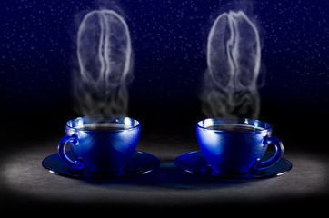 Two coffee cups with steam in the form of coffee beans
