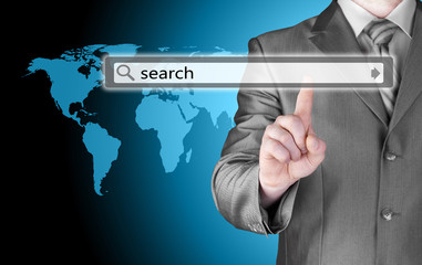 Businessman pushing virtual search bar