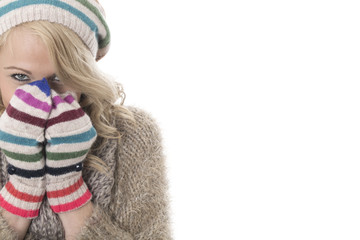 Model Released. Cold Young Woman Wearing a Wooly Hat and Gloves