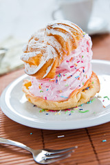Delicate puff profiterole filled with delicious cream