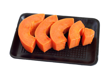 Papaya chunks on foam tray
