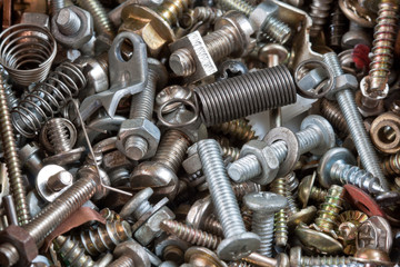 Heap of metal screws and components
