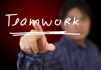 man hand touching button teamwork keyword.