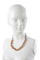 Manikin with brown amber necklace