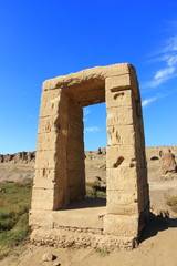 ancient gates with Egyptian symbols