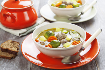 Soup with meatballs and brussels sprouts