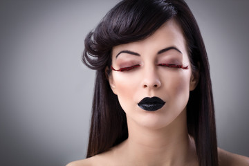 Fototapeta premium closeup portrait of a beautiful young woman with elegant long ha