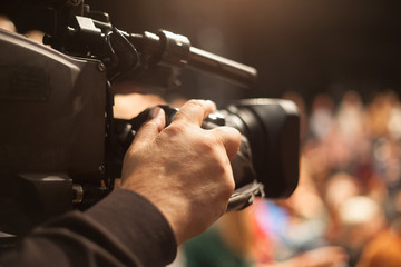 cameraman at conference