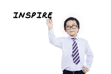 Child writing on glass board