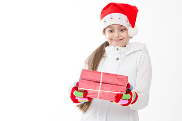 girl in a red hat holding a box with a gift. surprise