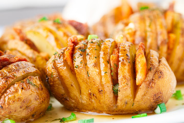 Accordion baked potatoes with bacon