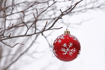 A red snow flake Christmas bauble 