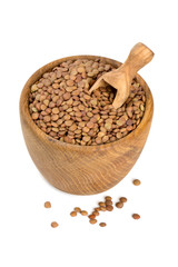brown lentils in a woden bowl