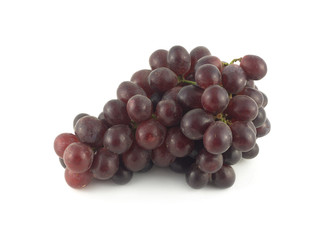 Red wine grape branch with tasty berries isolated closeup