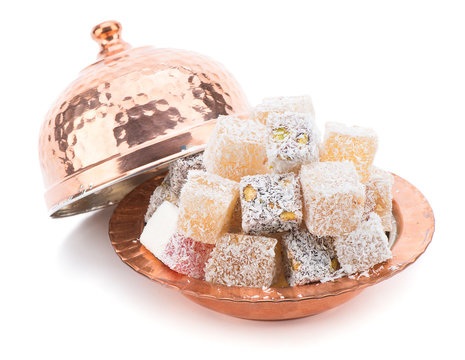Assortment of Turkish delight in traditional copper bowl