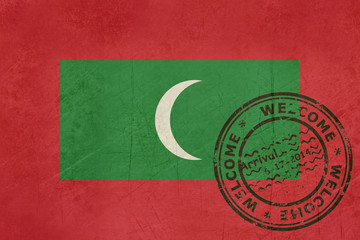 Welcome to Maldives flag with passport stamp