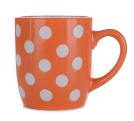 Color polka dot mug isolated on white