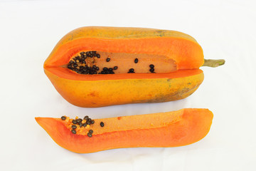 Papaya sliced isolated and cut into pieces