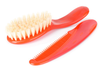 Baby brush with comb isolated on white