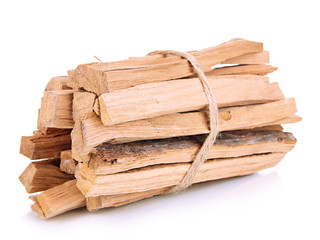 Stack of firewood isolated on white