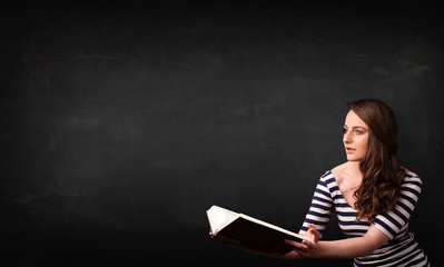 Young lady reading a book