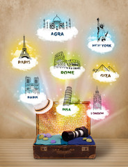 Tourist suitcase with famous landmarks around the world