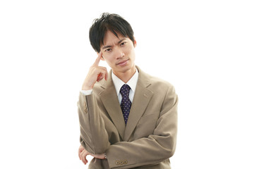 頭痛を訴えるビジネスマン