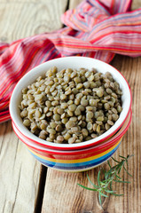 Boiled green lentils in a bowl